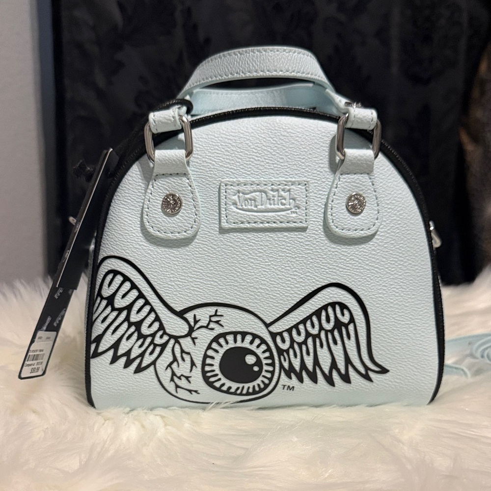 Von Dutch Light Blue Winged Eyeball Mini Bowler Bag